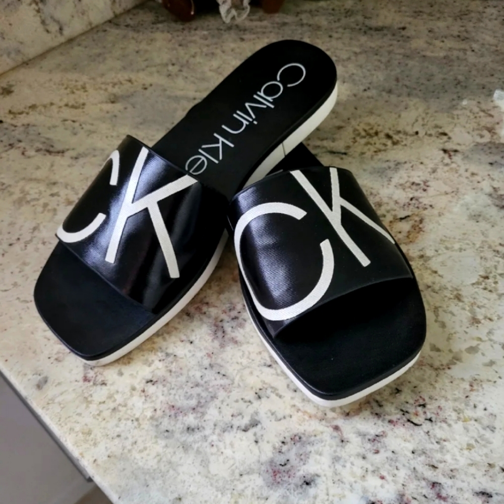 Calvin Klein Logo Slides